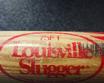 Genuine Vintage Louisville Slugger FireBall 75FT Official 34" Softball Bat.
