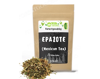 May include: A brown paper bag of Epazote (Mexican Tea) with a black label and the text "Premium grade". A small pile of dried green herbs sits in front of the bag. The bag has the text "forestgoodsbg".