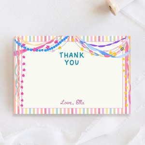 May include: A rectangular thank you card with a cream center and a border of vertical pastel stripes. The card features teal text that reads THANK YOU and pink script text that reads Love, Ella, decorated with colorful streamers and stars.