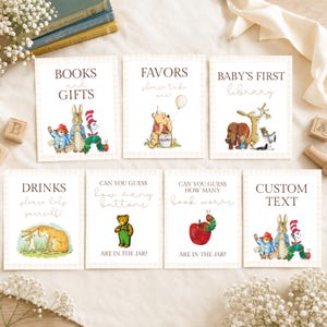 May include: Seven rectangular white cards with a light beige checkered border, each featuring classic storybook character illustrations and text. The cards display titles like Books and Gifts, Favors, Baby's First Library, Drinks, and various guessing game prompts.