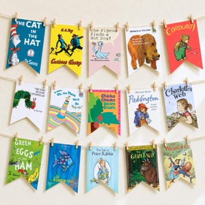 May include: A set of fifteen pennant-shaped paper banners featuring classic children's book covers including The Cat in the Hat, Curious George, The Pigeon Finds a Hot Dog, Brown Bear, Corduroy, The Very Hungry Caterpillar, Oh, the Places You'll Go, Chicka Chicka Boom Boom, Paddington, Charlotte's Web, Green Eggs and Ham, The Rainbow Fish, The Tale of Peter Rabbit, The Gruffalo, and The Wizard of Oz.