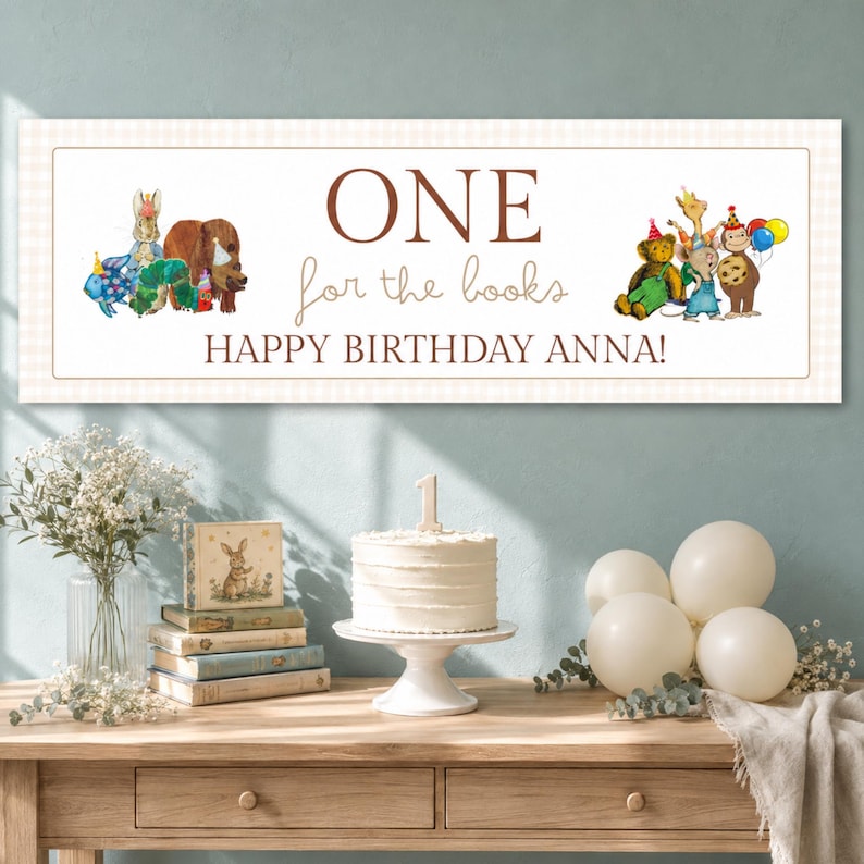 May include: A rectangular banner with a light beige checkered border featuring the text ONE for the books HAPPY BIRTHDAY ANNA! and watercolor illustrations of various animals including a bear, rabbit, and monkey wearing party hats.