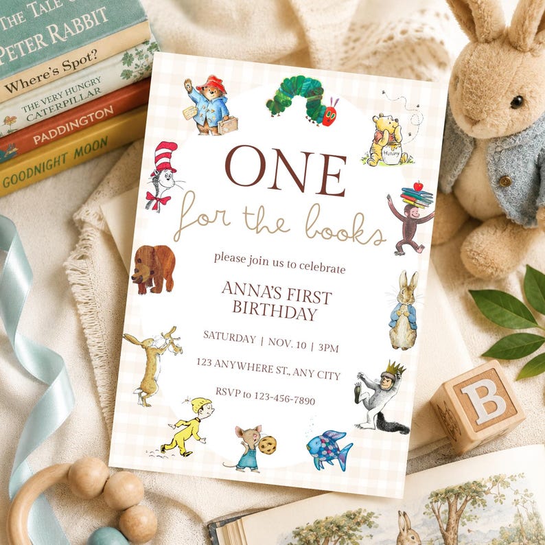 May include: A rectangular birthday invitation card with a light beige gingham background. The text reads ONE for the books, please join us to celebrate ANNA'S FIRST BIRTHDAY, SATURDAY | NOV. 10 | 3PM, 123 ANYWHERE ST., ANY CITY, RSVP to 123-456-7890. It features illustrations of various storybook characters.
