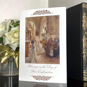 May include: A Confirmation greeting card with a detailed painting of a church interior. The card features the text "Blessings on the Day of Your Confirmation" in elegant script, framed by decorative flourishes. A bouquet of white roses is visible in the background.