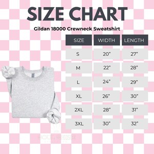 May include: A light gray Gildan 18000 crewneck sweatshirt next to a size chart. The chart lists sizes S to 3XL, with corresponding width and length measurements in inches. The text "SIZE CHART" is at the top.