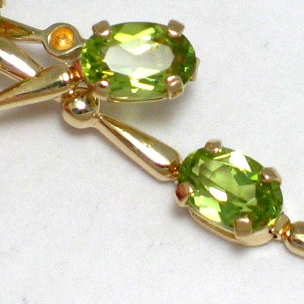 14k gold green peridot gemstone tennis link bracelet sz. SIZE 8 IN