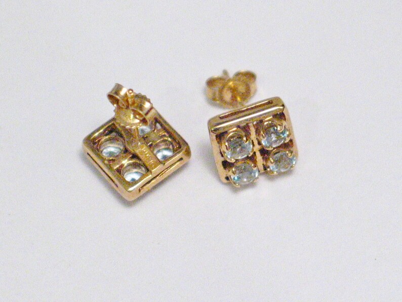 14k Gold earrings Sky blue topaz square cluster cocktail statement geometric style center located stud post womens naturalfine jewelry