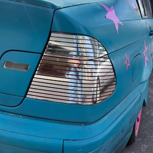 Calcomanía de vinilo a rayas para luz trasera JDM (juego de dos hojas)