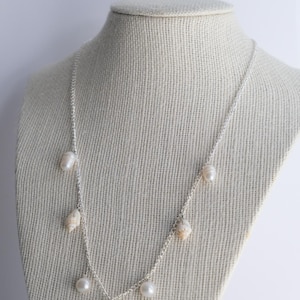 Cowrie Shell & Freshwater Pearl Charm necklace