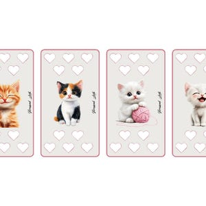 Op de afbeelding: Vier rechthoekige lichtgrijze kaarten met illustraties van kittens en hartvormige uitsparingen. De eerste toont een oranje cyperse kat, de tweede een lapjeskat, de derde een wit kitten met een roze bol wol en de vierde een lachend wit kitten.