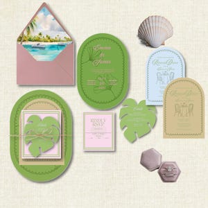 May include: A collection of wedding stationery, including invitations, RSVP cards, and a seashell. The invitations feature a tropical theme with green and pink accents. The RSVP card reads "Kindly RSVP".