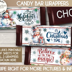 May include: Candy bar wrappers with winter-themed designs. The wrappers feature snowmen, snowflakes, and the phrases "Holiday Cheer", "It's Christmas Time", and "Believe in the magic!". The wrappers are brown with white text and illustrations.