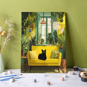May include: A painting of a yellow sofa with a black cat sitting on it, surrounded by lush green plants. The background features a window with natural light and a warm, inviting interior scene. The artwork has a modern, illustrative style.