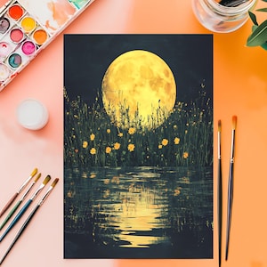 May include: A painting of a full moon over a body of water, with tall grass and yellow flowers in the foreground. Paintbrushes, a palette of watercolors, and a jar of water are arranged around the artwork on a pink and orange surface.