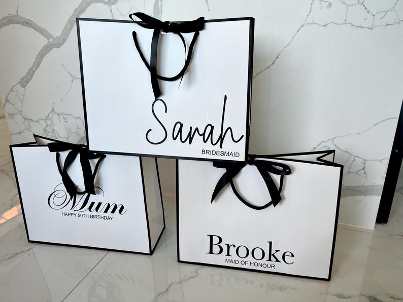 Luxury white gift bag with ribbon bow, personalised for engagement, birthday, or baby shower celebrations