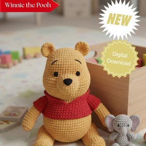 May include: A crocheted Winnie the Pooh plush toy in yellow with a red shirt, sitting next to a small gray crocheted elephant. The image includes a wooden box and the text "Winnie the Pooh" and "NEW" and "Digital Download".