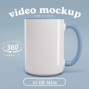 May include: A white 15 ounce mug with a light blue rim and handle. The mug is blank and ready to be customized. The text "BLANK WHITE 15 OZ MUG" is displayed below the mug.