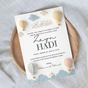 1. “Editable Islamic baby boy birth announcement in neutral pastel design”
2. “Modern Muslim newborn printable with Arabic Bismillah”
3. “Soft felt balloon nursery baby announcement 6x8 inch template”