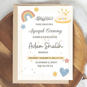 May include: A baby Aqeeqah ceremony invitation with a beige background and a brown border. The invitation features a rainbow, stars, and a smiling cloud. Text includes "Aqeeqah Ceremony" and the name "Adam Shalih".