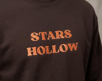 Felpa Star Hollow / Girocollo con testo arancione retrò