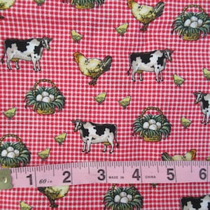 Two Red Fabrics Featuring Cows