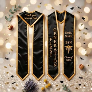 May include: A white ceramic mug with a black handle and the text "But First, Coffee" in a black, bold font. The mug is on a wooden surface. The mug is approximately 10 cm tall.