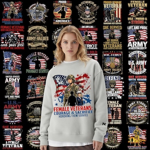 May include: A light gray sweatshirt featuring a graphic of a female soldier in front of an American flag, with text that reads "Female Veterans: Courage & Sacrifice, Honoring Their Service." Surrounding the main image are smaller graphics with patriotic themes.