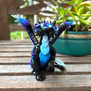 Feathery Black and Blue Dragon