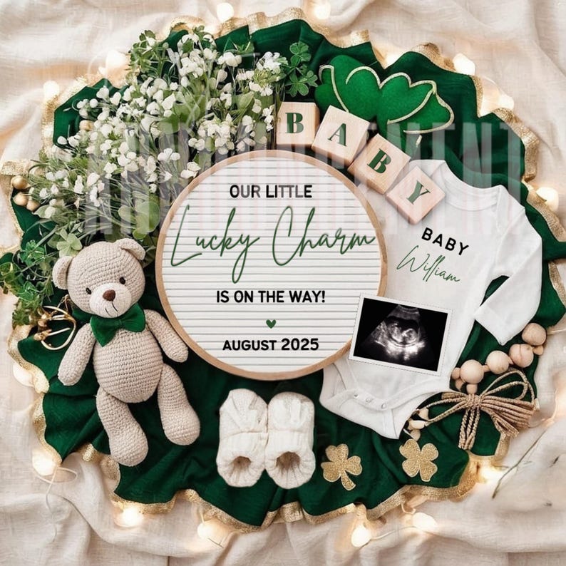May include: A green and gold baby announcement with a sign that reads "Our Little Lucky Charm is on the way! August 2025". There are also baby booties, a teddy bear, and a onesie with the words "Baby William" on it.