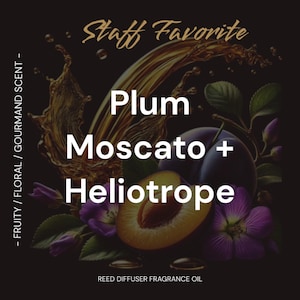 May include: A reed diffuser fragrance oil bottle with a label that reads "Staff Favorite Plum Moscato + Heliotrope". The label is surrounded by a golden liquid splash and images of plums and purple flowers.