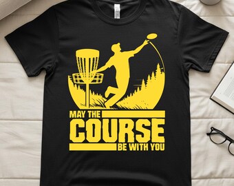 Camiseta de disc golfista, "Que el campo te acompañe", para amantes del disc golf.