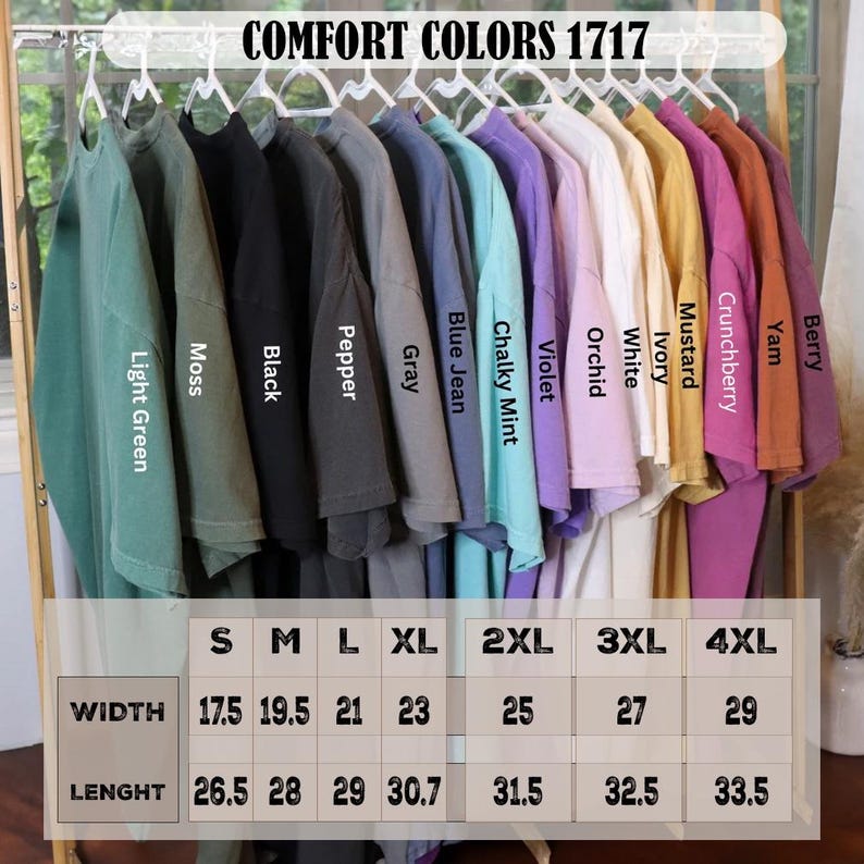 May include: A size chart for t-shirts in sizes S through 4XL. The chart shows the width and length measurements in inches for each size. The t-shirts are available in 12 colors: Light Green, Moss, Black, Pepper, Gray, Blue Jean, Chalky Mint, Violet, Orchid, White, Ivory, Mustard, Crunchberry, Yam, and Berry.
