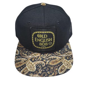Snapback-hoed met platte rand - Old English 808