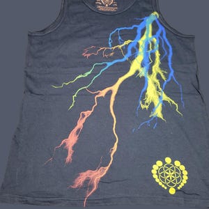 May include: A black tank top with a colorful lightning bolt design and a yellow flower of life symbol on the bottom right corner.