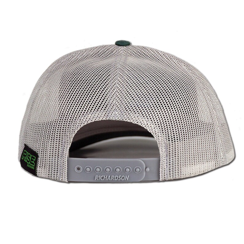 May include: A gray and green mesh trucker hat with a black patch that says "RISE" in green letters. The hat has a gray adjustable strap with the word "RICHARDSON" printed on it.