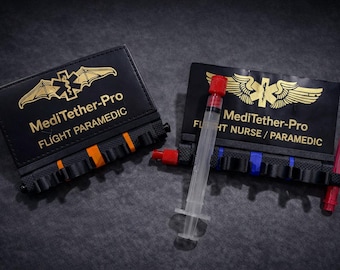Versión de vuelo: Sistema modular de gestión de jeringas MediTether-Pro / Soporte magnético retráctil para jeringas