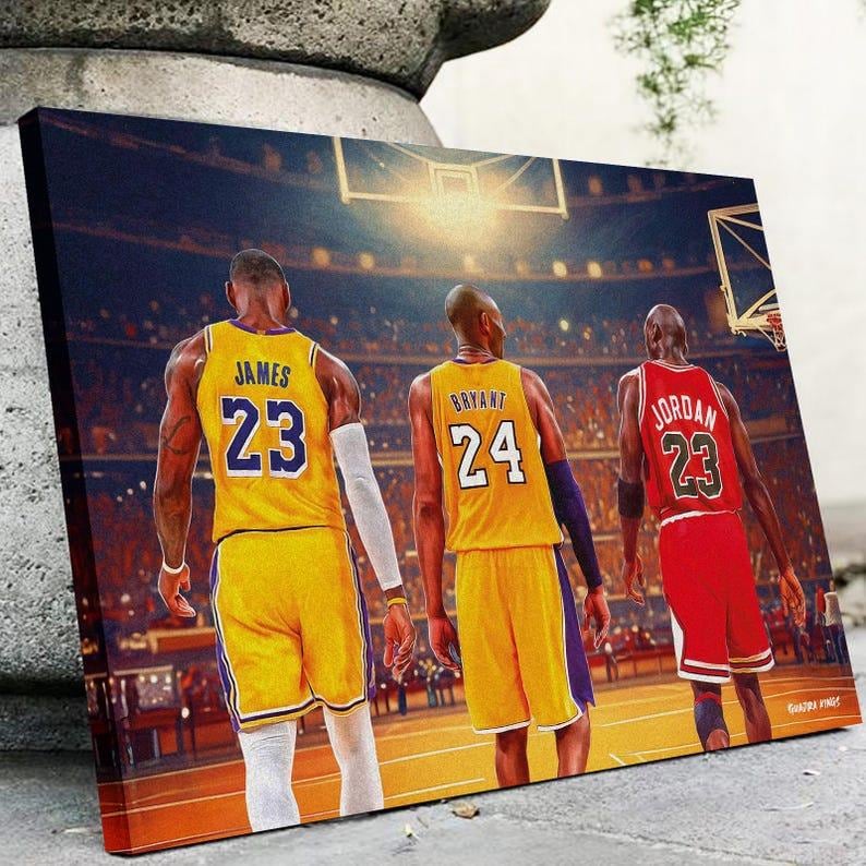 May include: A canvas print featuring three basketball players in their jerseys. LeBron James in a yellow jersey with the number 23, Kobe Bryant in a yellow jersey with the number 24, and Michael Jordan in a red jersey with the number 23.