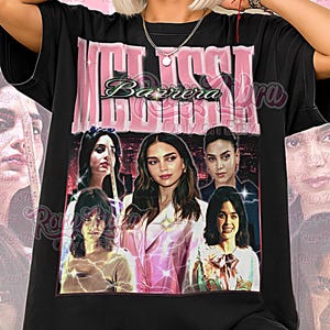May include: Black unisex shirt featuring a graphic of the name "Melissa Barrera" in pink and white, with a collage of images. The shirt also has the text "Unisex Shirt" in pink.