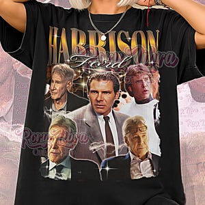 May include: Black unisex t-shirt featuring a graphic of Harrison Ford with the text "Harrison Ford" in gold lettering. The shirt has a vintage design with multiple images of the actor. The words "Unisex Shirt" are at the bottom.
