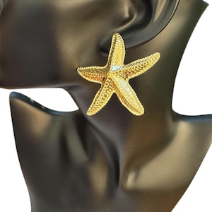 Gold starfish earring in stainless steel,