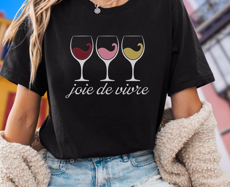 Bella Canvas 3001 wine shirt featuring three wine glasses filled with red, rosé, and white wine with the French phrase "joie de vivre," a perfect French-inspired graphic tee for wine lovers.