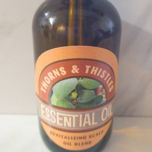 Thorns and Thistles revitalizing hair and scalp treatment oil. Handmade with love