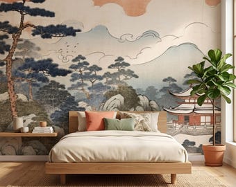 May include: A bedroom featuring a wooden bed frame with a beige duvet, two orange pillows, and one green pillow. The wall displays a mural of a landscape with pine trees, mountains, clouds, and a temple. A potted plant sits on the floor.