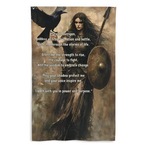 May include: A digital art print depicting a woman with long dark hair holding a shield and a spear. She stands against a dark backdrop with a raven perched on her arm. The print features a quote about the Morrigan, a Celtic goddess of transformation and battle.