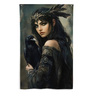 May include: A woman with long black hair and a crown of feathers and jewels holds a black raven in her arms. She is wearing a dark, tattered dress with a skull and crossbones design.