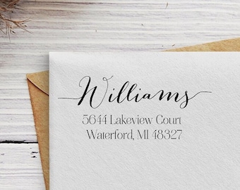 May include: A white envelope with a return address label. The label has the name "Williams" in cursive script, followed by the address "5644 Lakeview Court, Waterford, MI 48327".