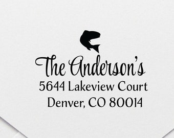 May include: A black and white return address stamp with a fish silhouette and the text "The Anderson's 5644 Lakeview Court Denver, CO 80014"
