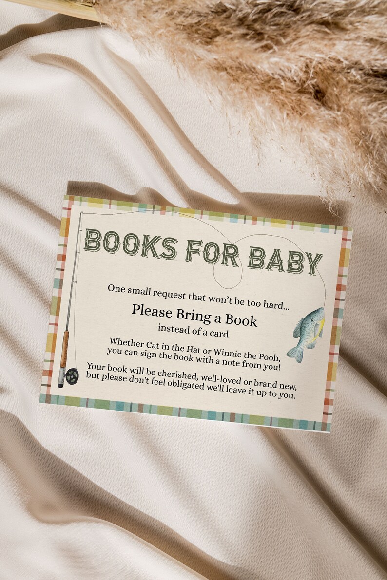 May include: A light blue and green card with a plaid pattern and a fishing rod design. The card says "Books for Baby" and asks guests to bring a book instead of a card. The text also says "Whether Cat in the Hat or Winnie the Pooh, you can sign the book with a note from you!" and "Your book will be cherished, well-loved or brand new, but please don't feel obligated we'll leave it up to you."