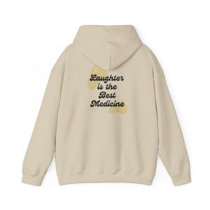 Laughter is the Best Medicine Unisex Heavy Blend™ Hooded Sweatshirt. Styled for comfort with trendy colors.