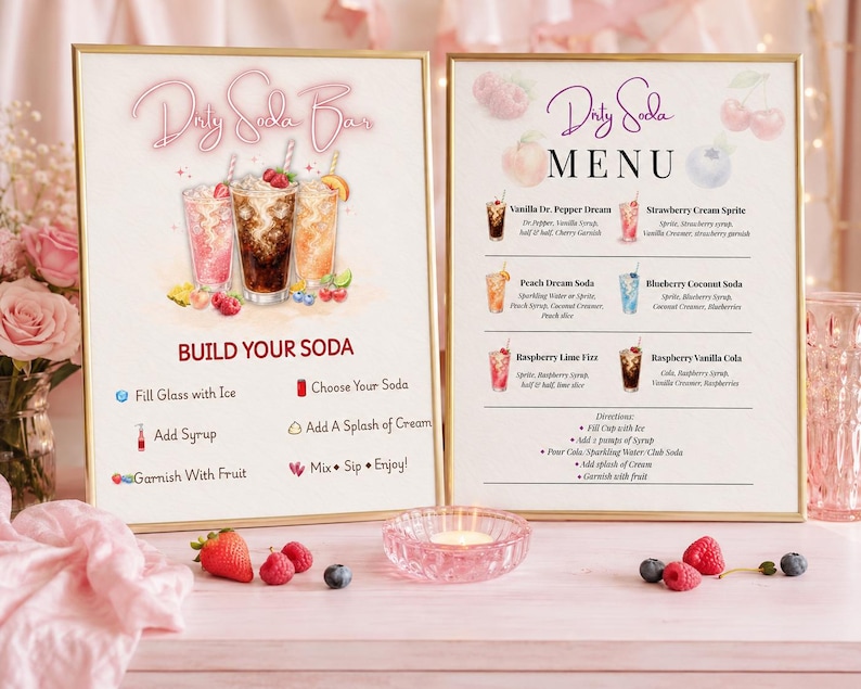 May include: Two framed signs for a Dirty Soda Bar. The left sign features three soda illustrations and instructions: Fill Glass with Ice, Choose Your Soda, Add Syrup, Add A Splash of Cream, Garnish With Fruit, Mix, Sip, Enjoy. The right sign lists a menu.